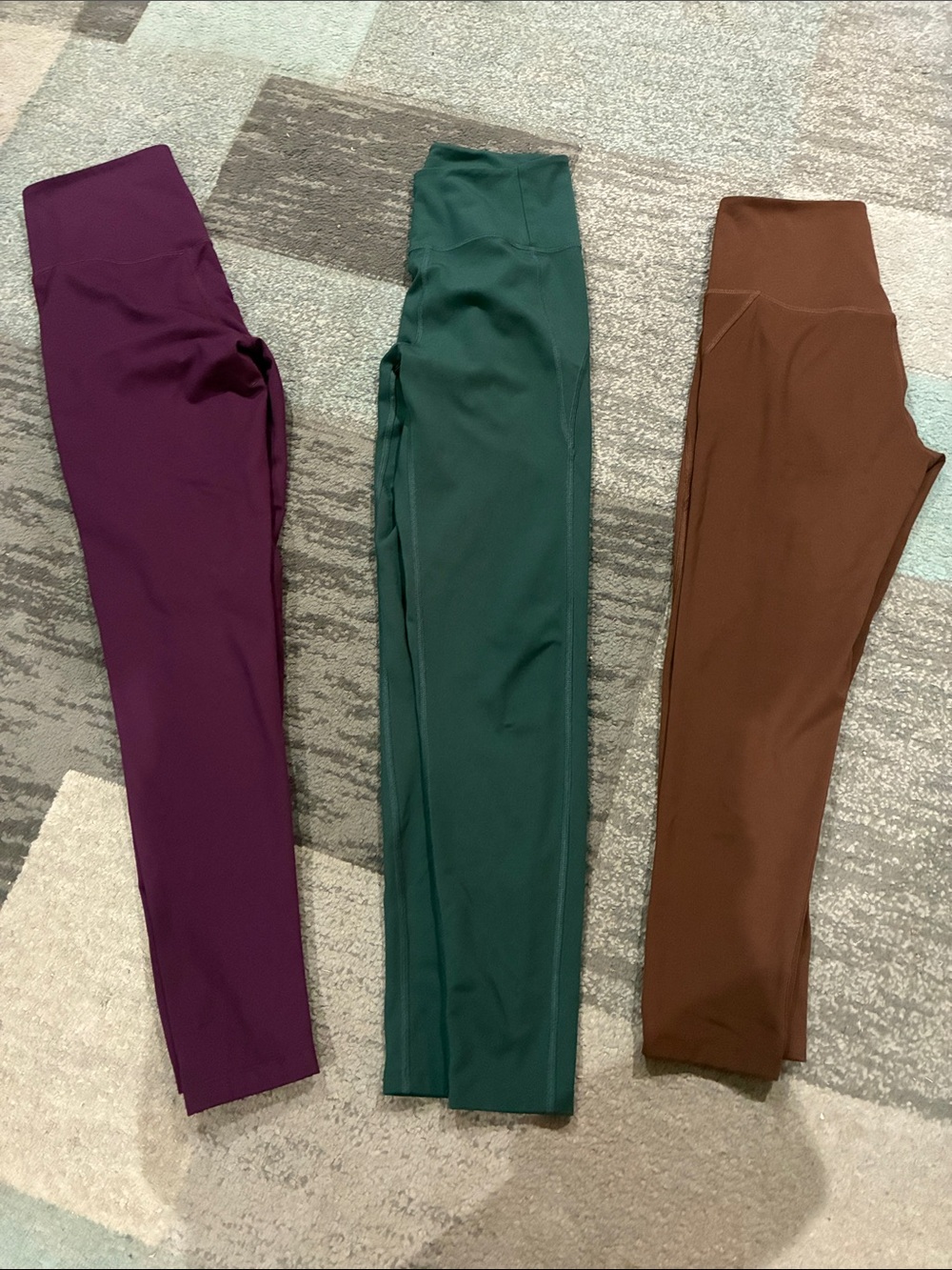 girlfriend collective High-Waist Leggings in Plum, Forest, and Chestnut